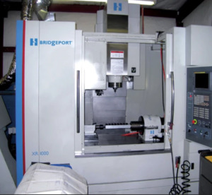 Aero Precision Machine runs a direct-drive rotary system on a vertical machining center to produce high precision parts for the pharmaceutical industry’s capsule inspection process.